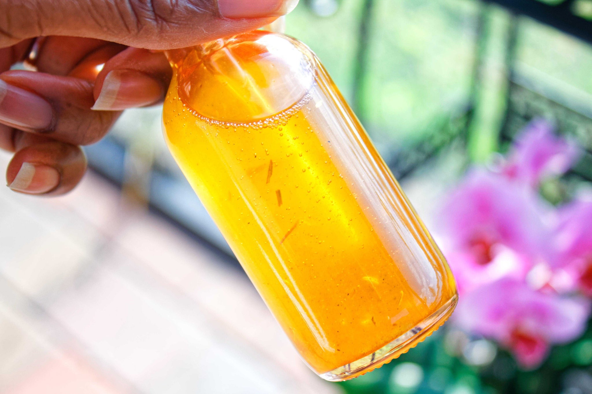 Organic herbal growth oil with Batana, Chebe, and Qasil – natural leave-in treatment for curly hair